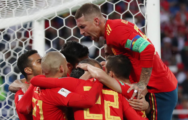 包含西班牙队力克瑞典队，稳固小组头名位置！的词条